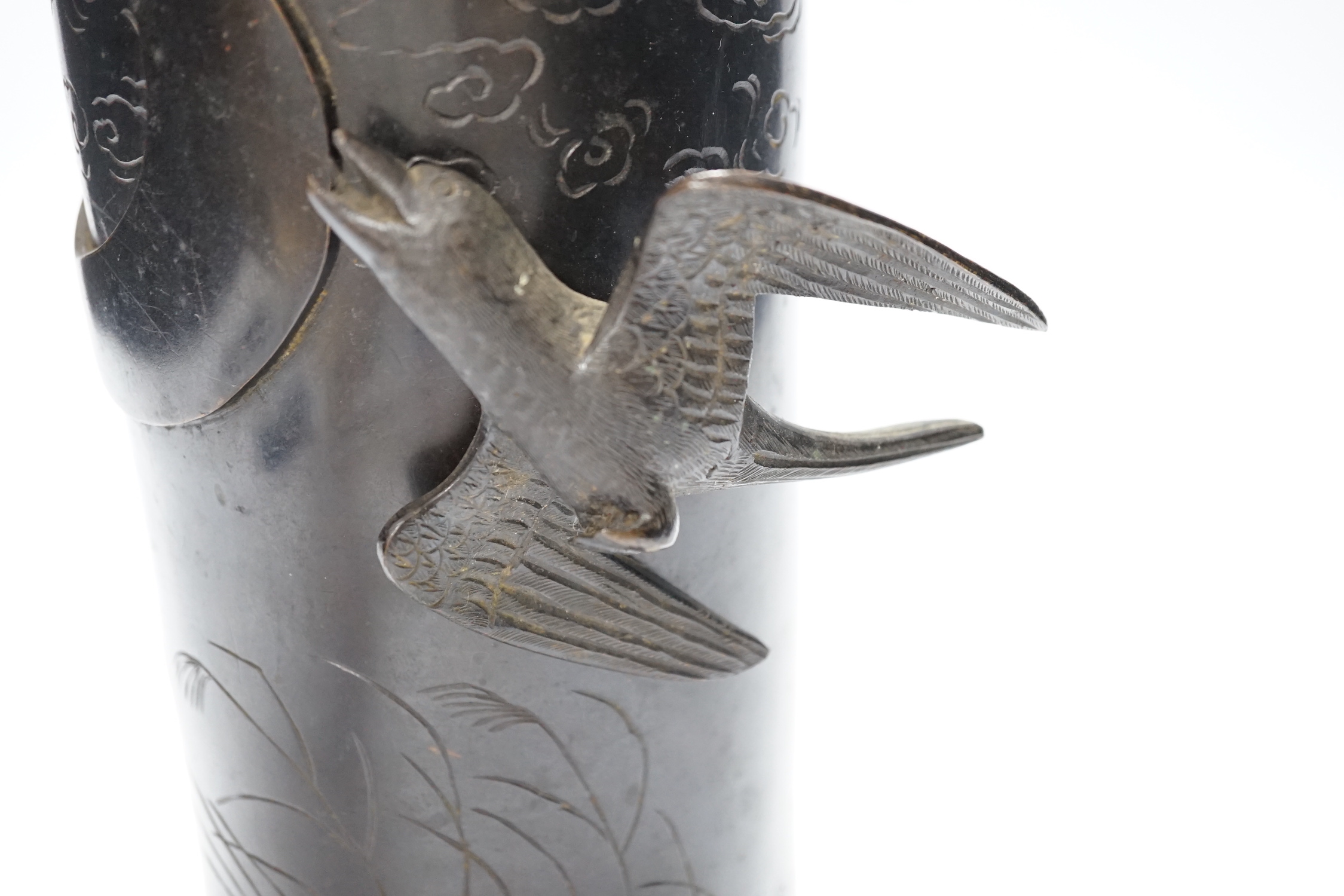 A Japanese bronze cylinder vase with applied bird, 28cm